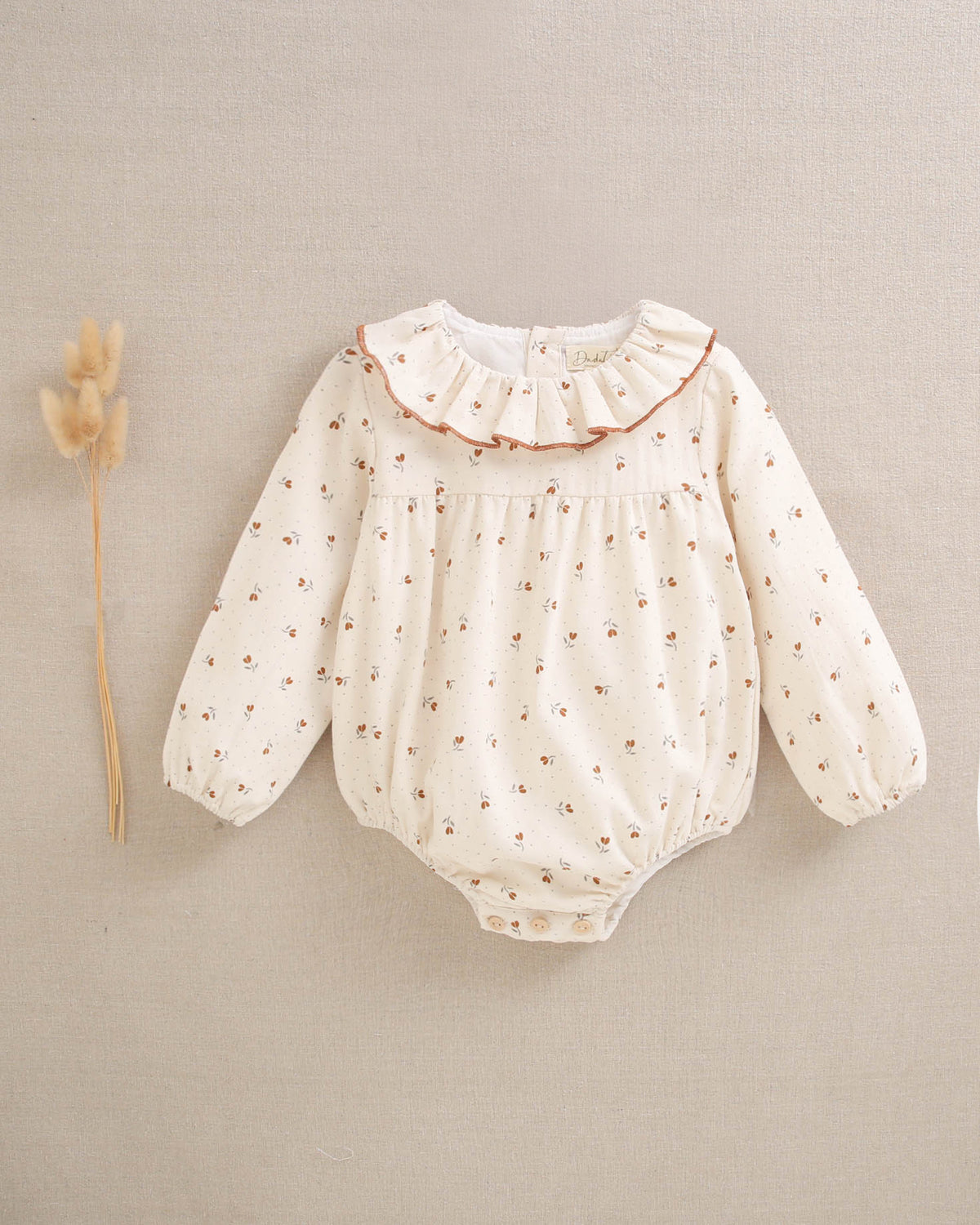 Ranita de bebé niña beige con estampado de flores