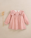 Vestido de bebé niña de cuadros rosa y flores bordadas