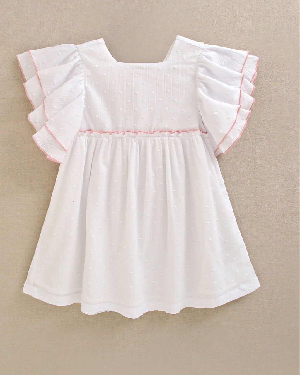 Vestido de niña de plumeti blanco con volantes en manga