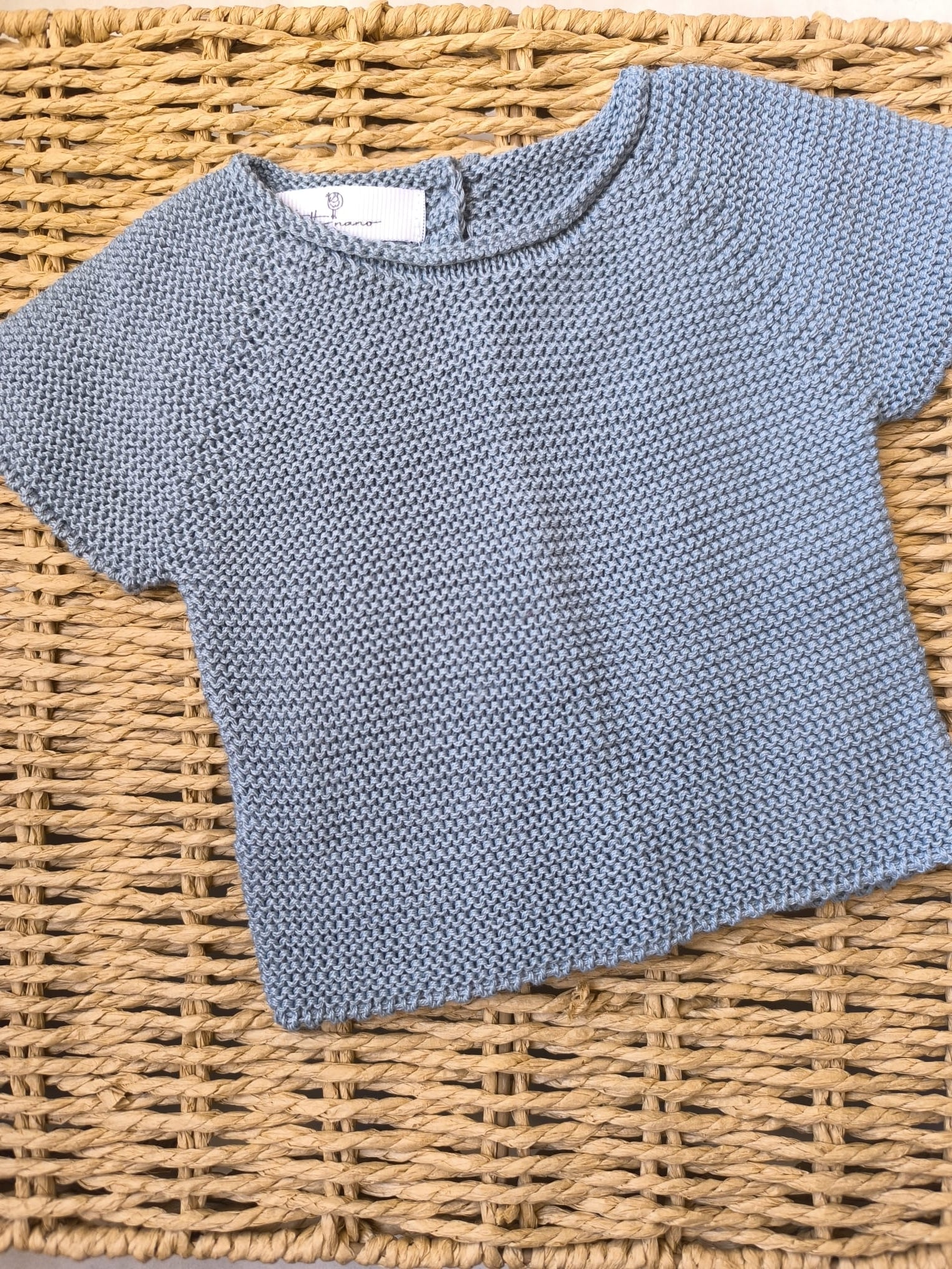 Conjunto jersey en manga corta y cubrepañal en punto bobo