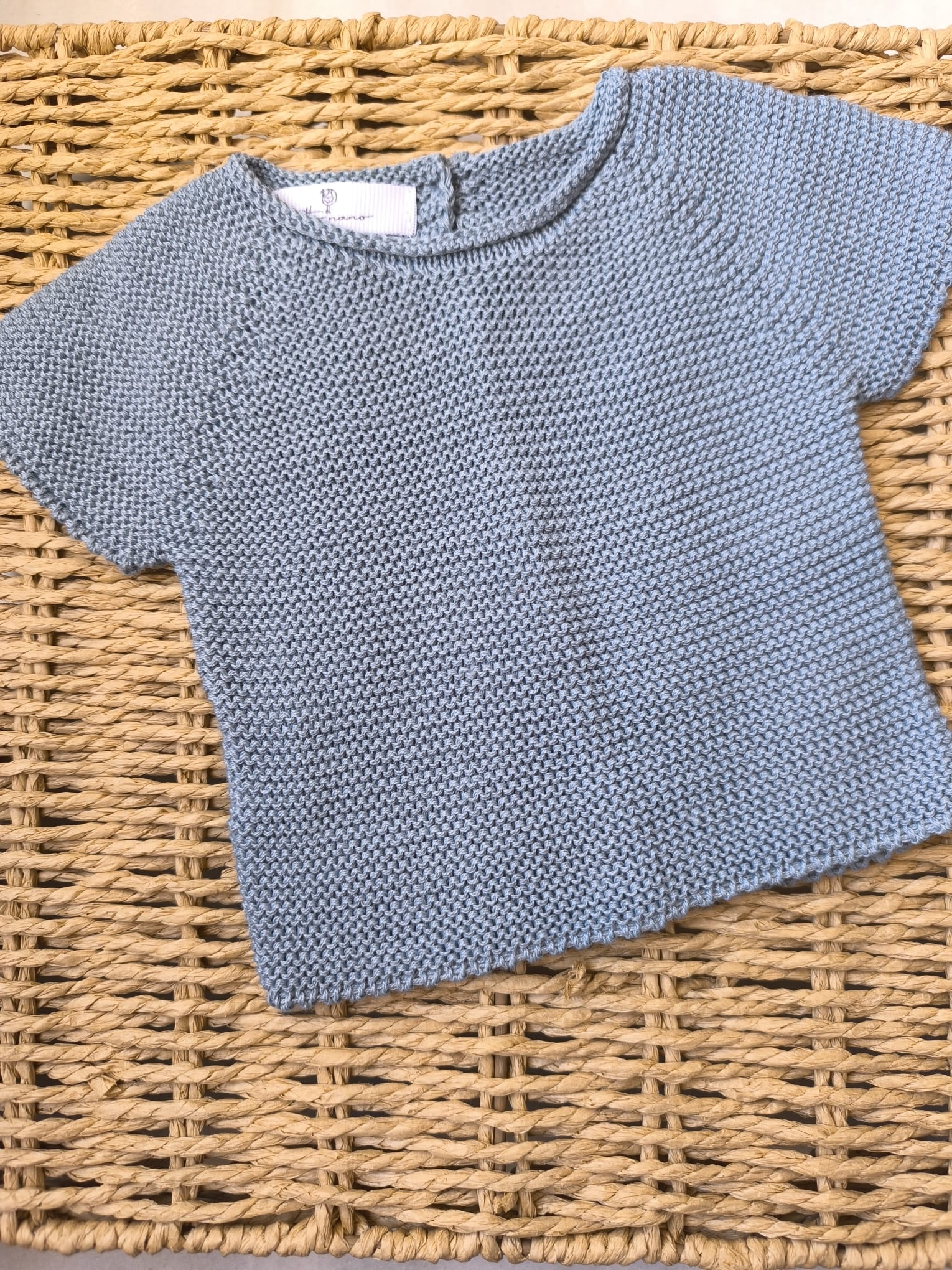 Conjunto jersey en manga corta y cubrepañal en punto bobo