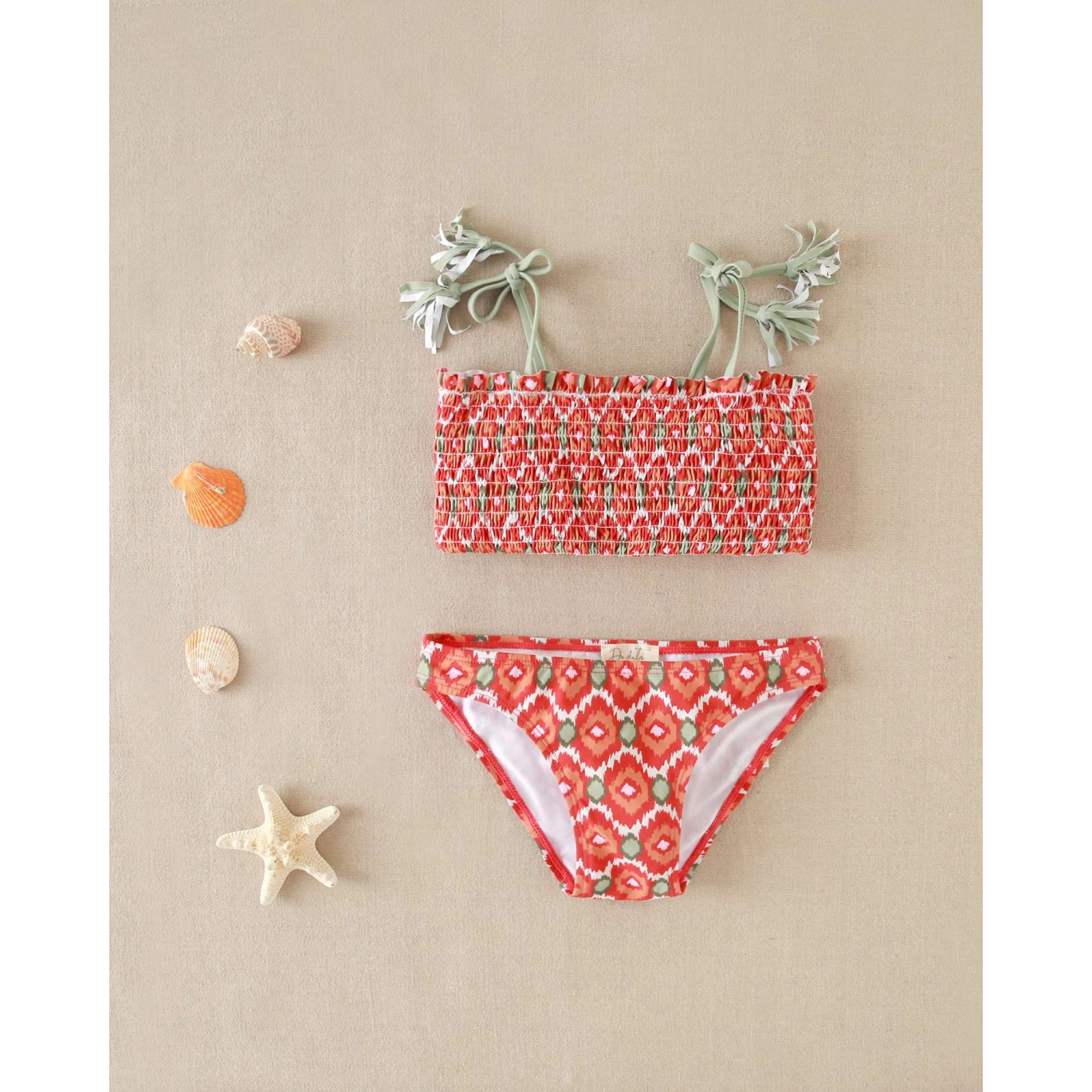 Bikini de niña con estampado geométrico y nido de abeja