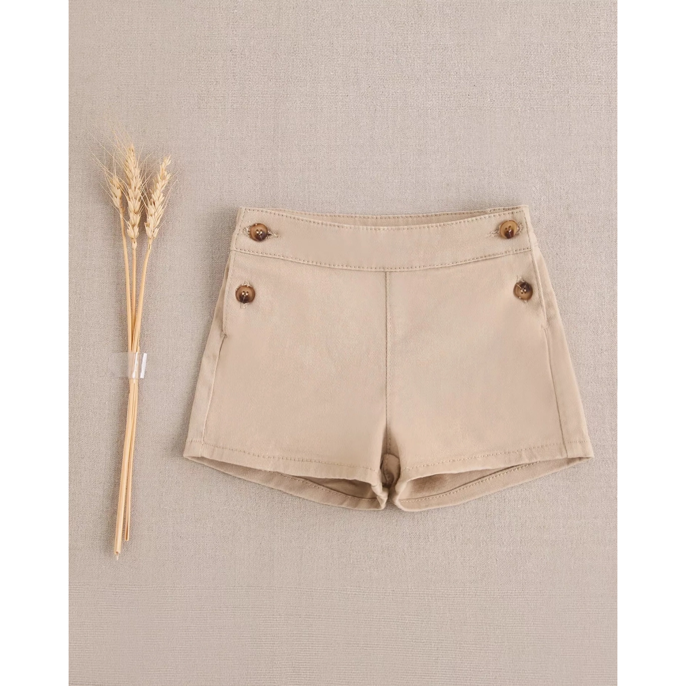 Short de bebé niño beige con botones