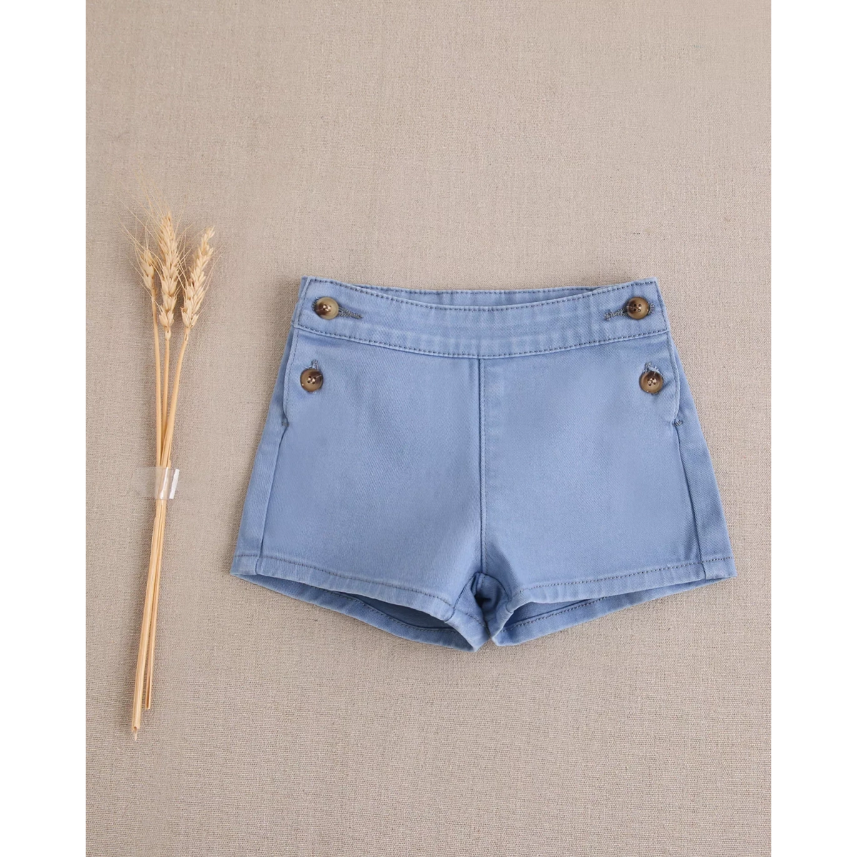 Short de bebé niño color azul con botones