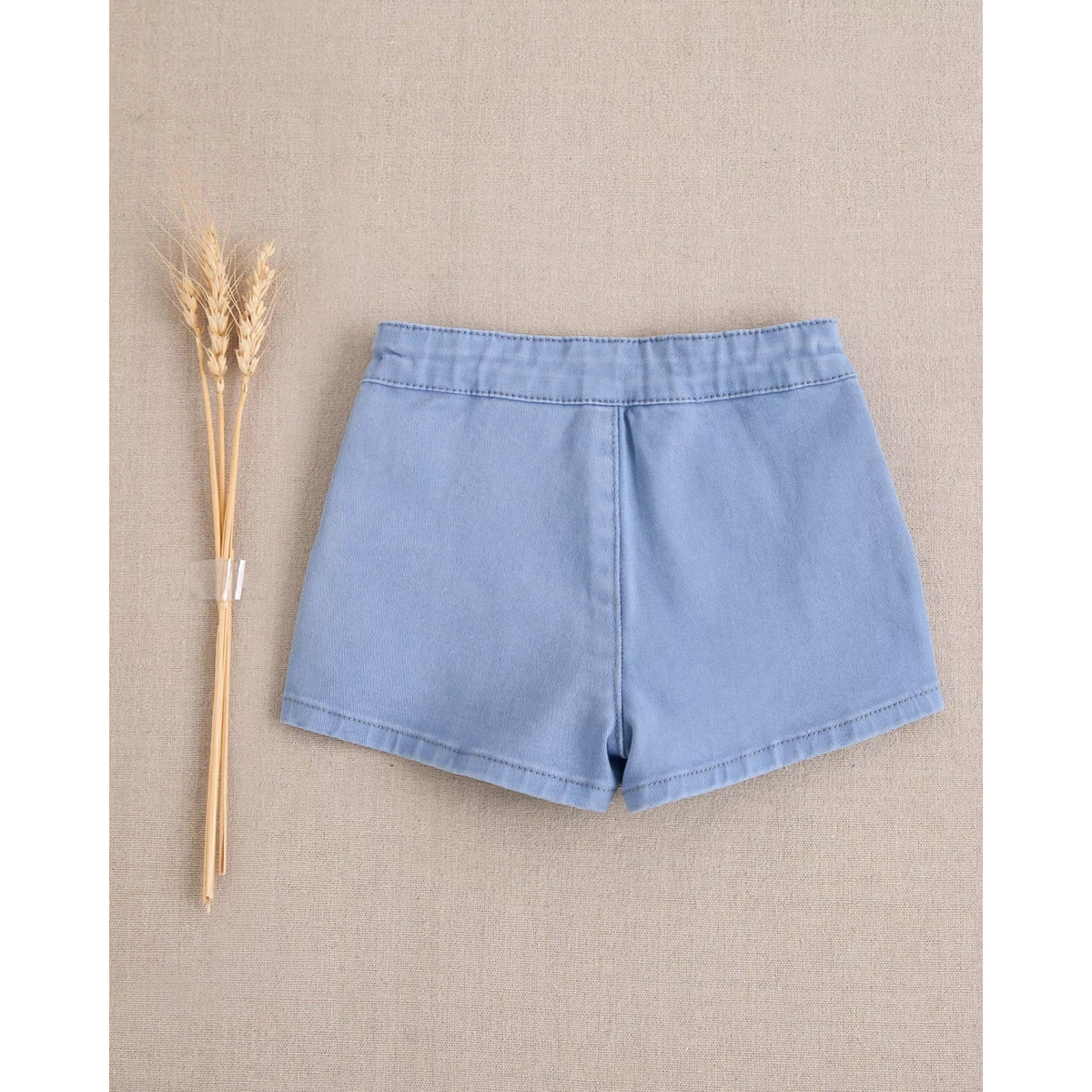 Short de bebé niño color azul con botones