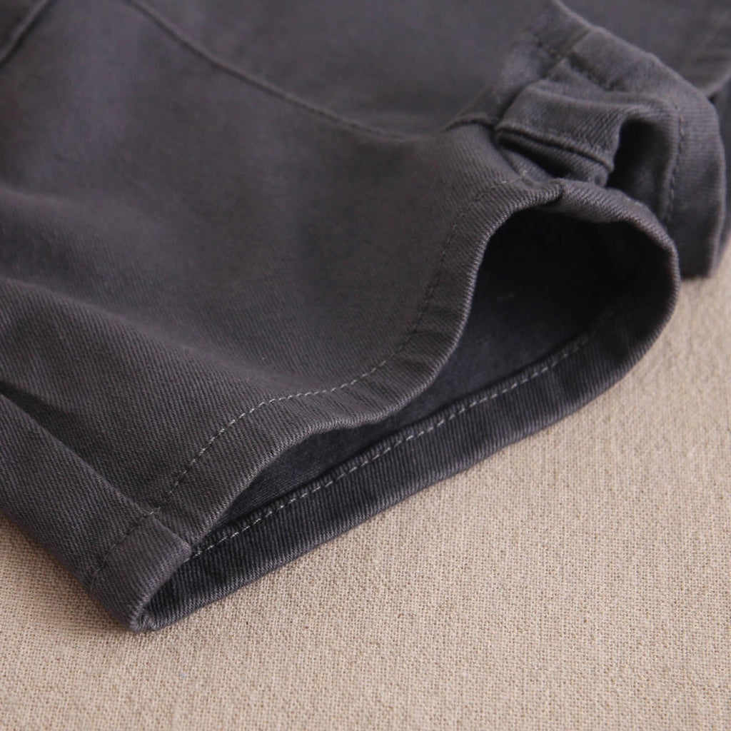Short de bebé niño en gris con botones laterales