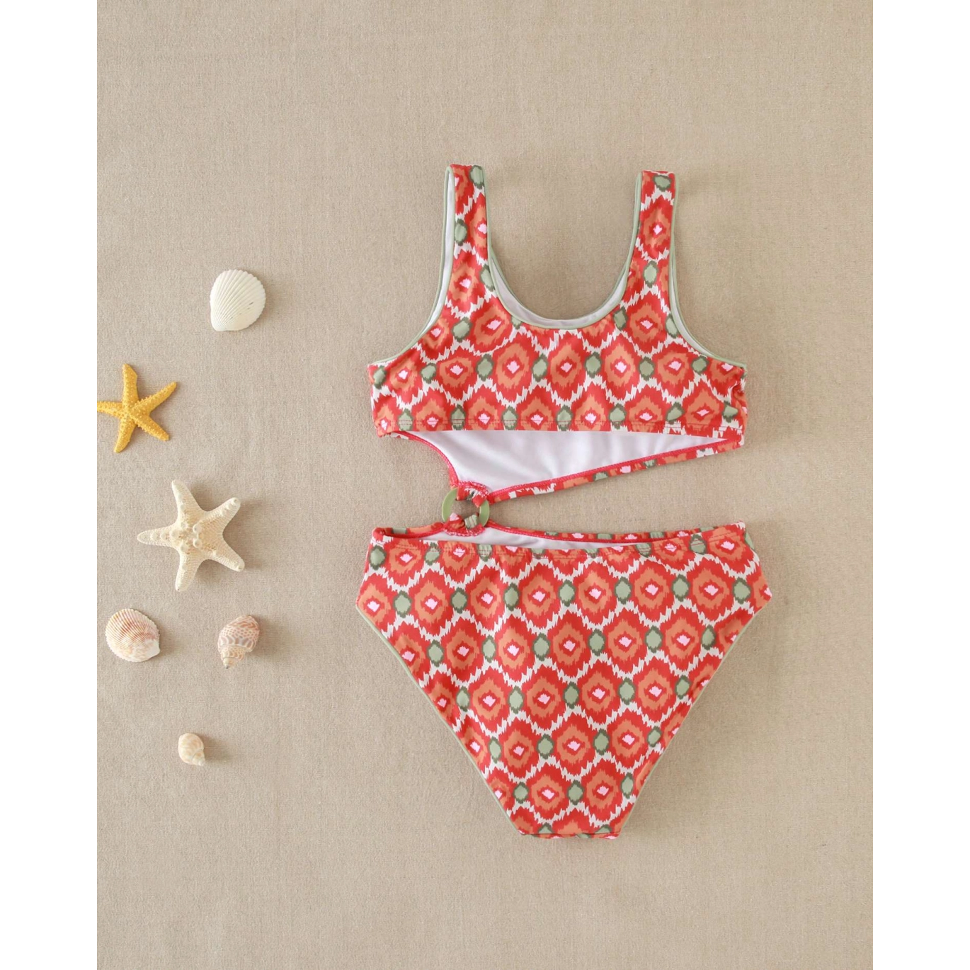 Trikini de niña con estampado geometrico y detalle en la cintura