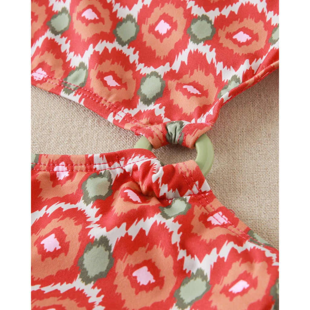 Trikini de niña con estampado geometrico y detalle en la cintura