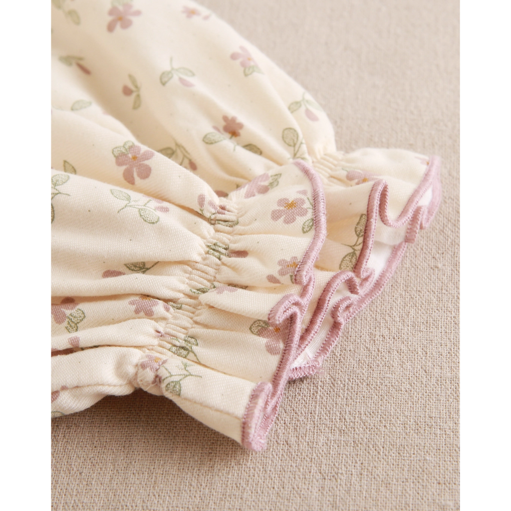 Vestido de niña de flores con volantes rosa