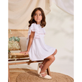 Vestido de niña de plumeti blanco con volantes en manga
